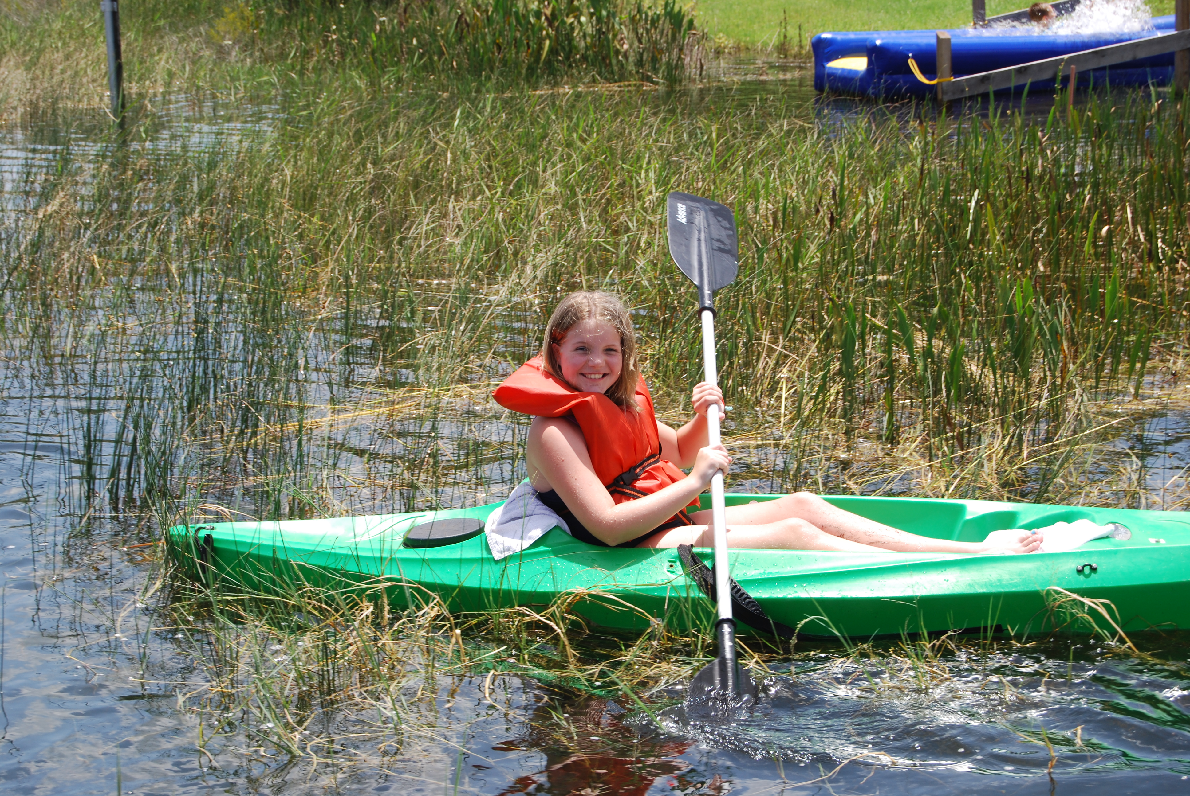 Girl camper on kayak