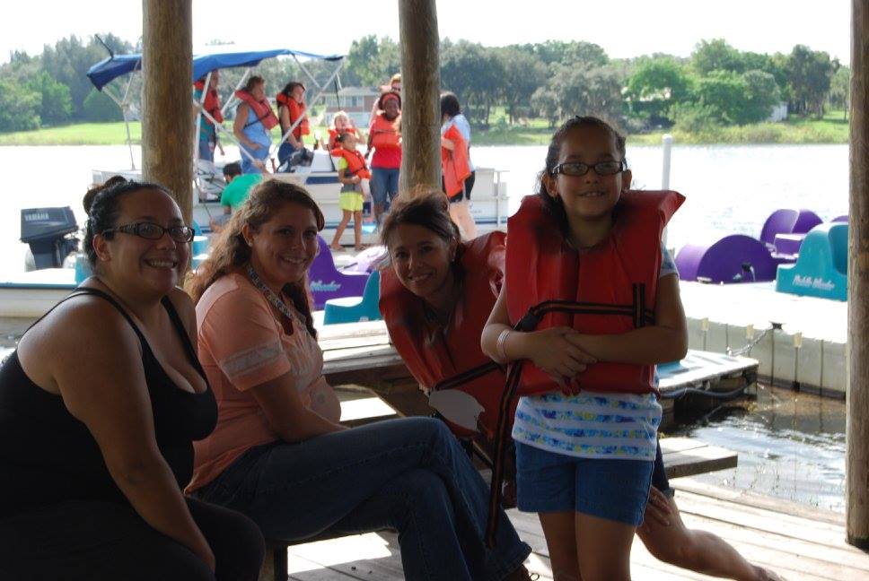 Mothers and daughters spend time together at the boats
