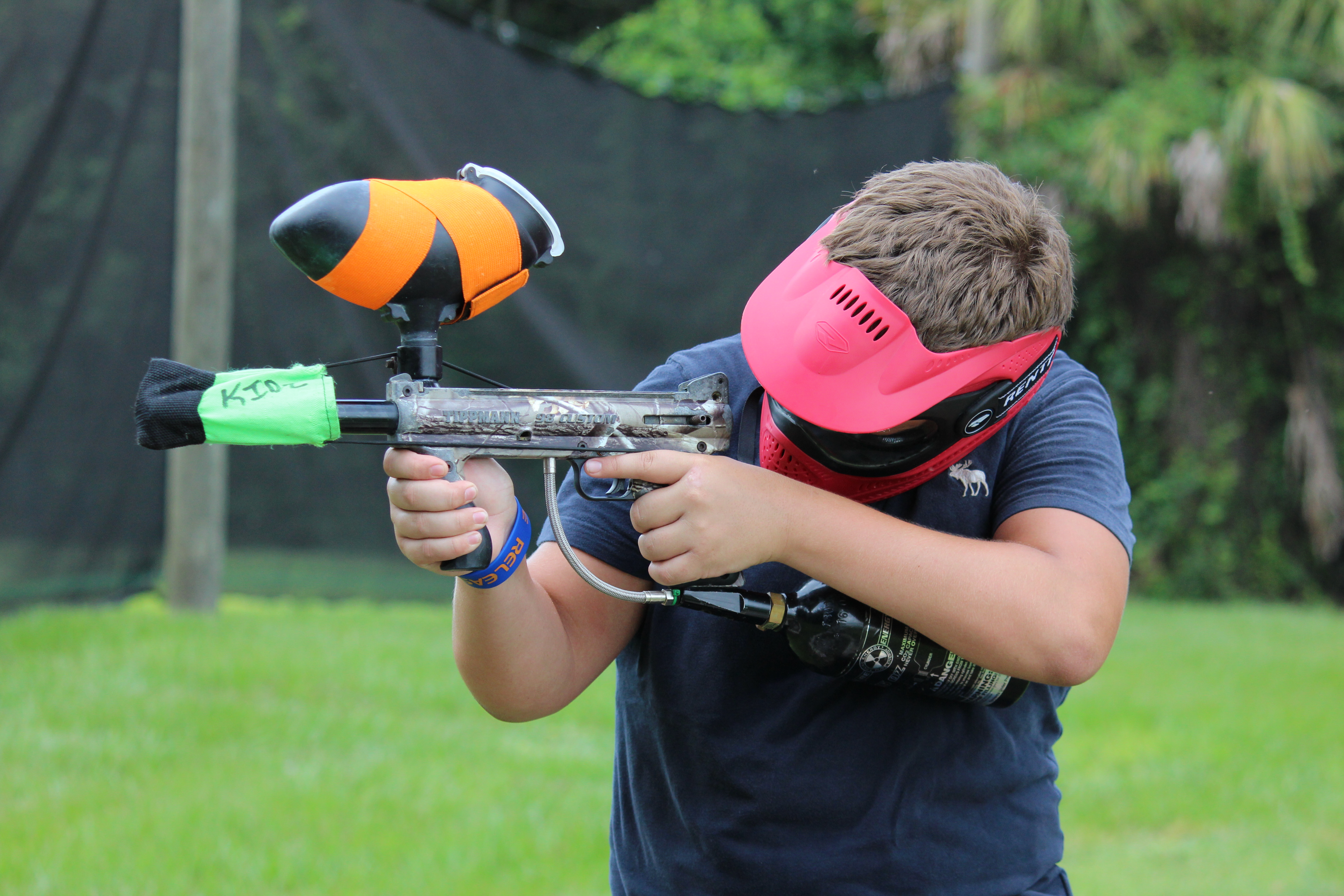 Camper takes aim with paintball gun